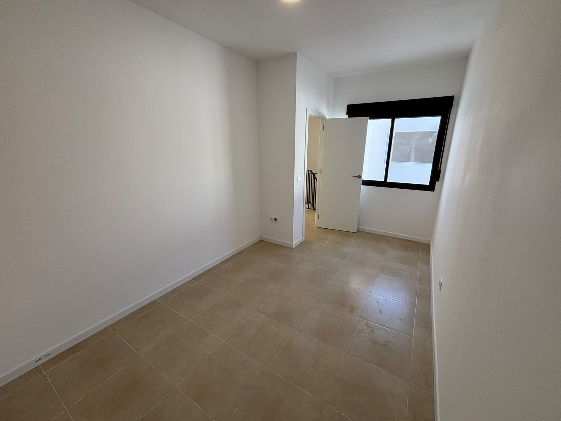 Dormitorio interior amplio
